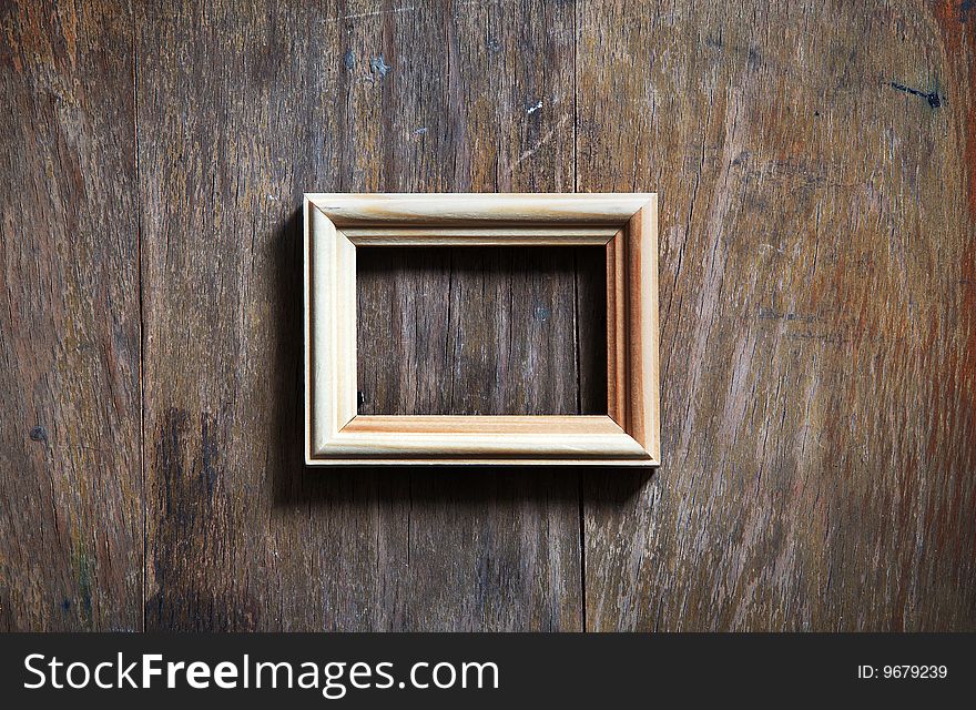 Empty Frame On Wooden Background