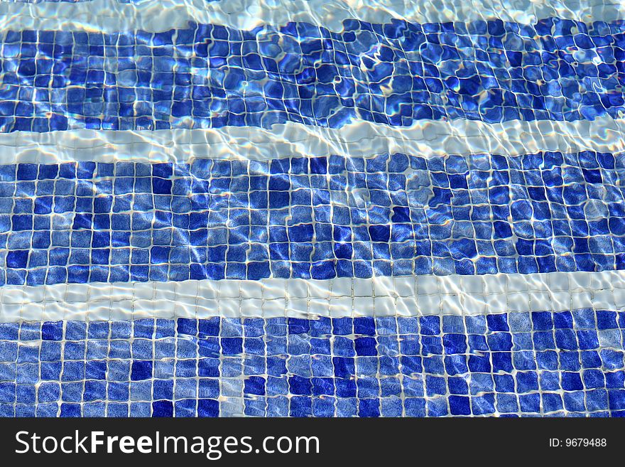 Blue water in swimming pool