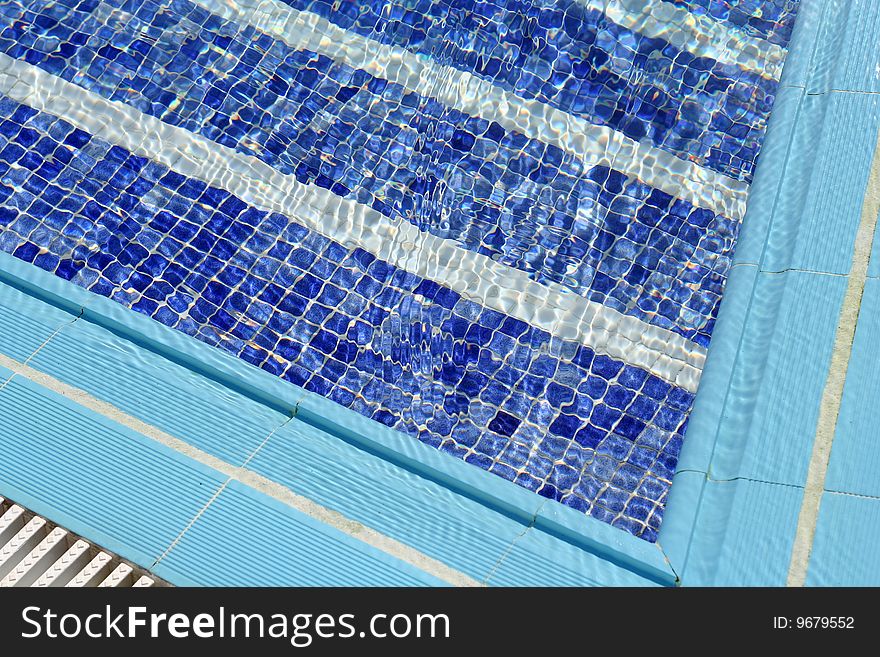 Blue water in swimming pool