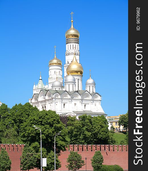 Golden dome in Moscow Kremlin over blue sky. Golden dome in Moscow Kremlin over blue sky