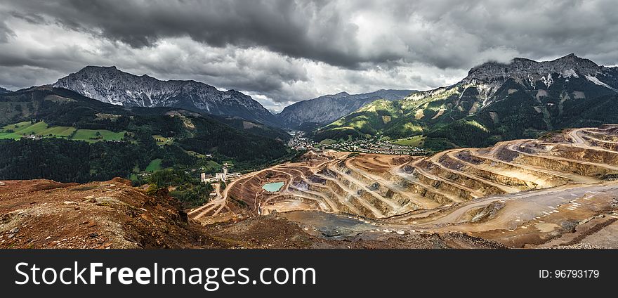 Brown Rice Terraces Under Gray White Sky during Daytime
