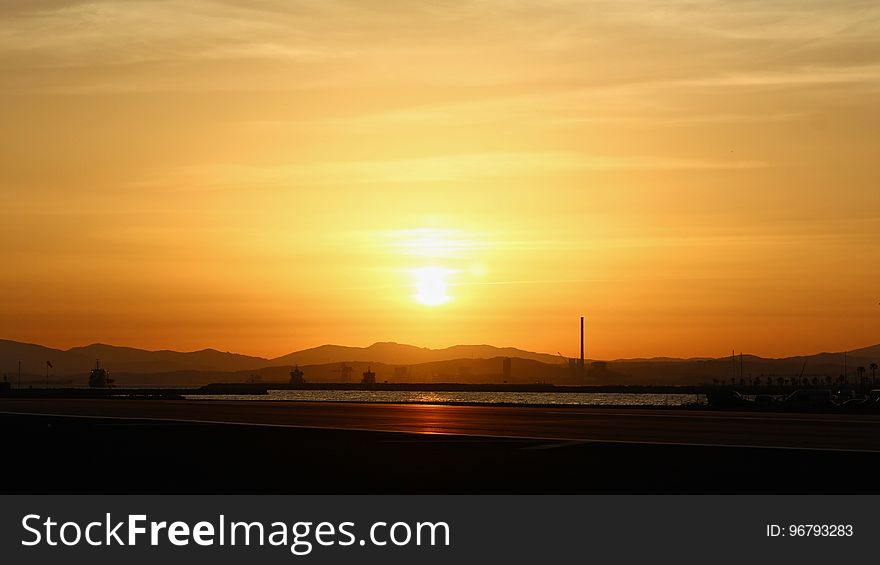 Silhouette of Mountain Under Sunset