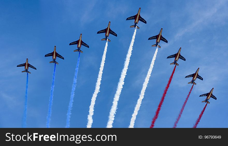 Nine Alpha Jets from the French Air Force fly over the Champs-ElysÃ©es, releasing trails of blue, white and red smoke, colours of the French national flag. Nine Alpha Jets from the French Air Force fly over the Champs-ElysÃ©es, releasing trails of blue, white and red smoke, colours of the French national flag.