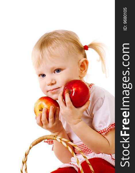 Small girl with red apples. Small girl with red apples