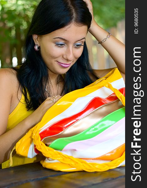 Lovely young girl with bag