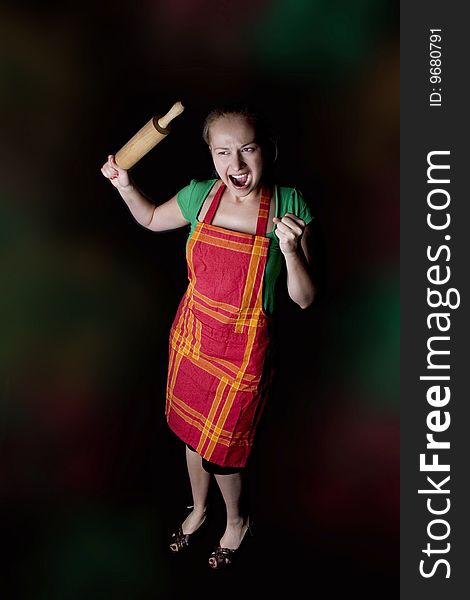 woman with kitchen tool (rolling pin). woman with kitchen tool (rolling pin)