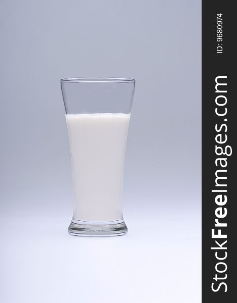 A glass of milk on white  background
