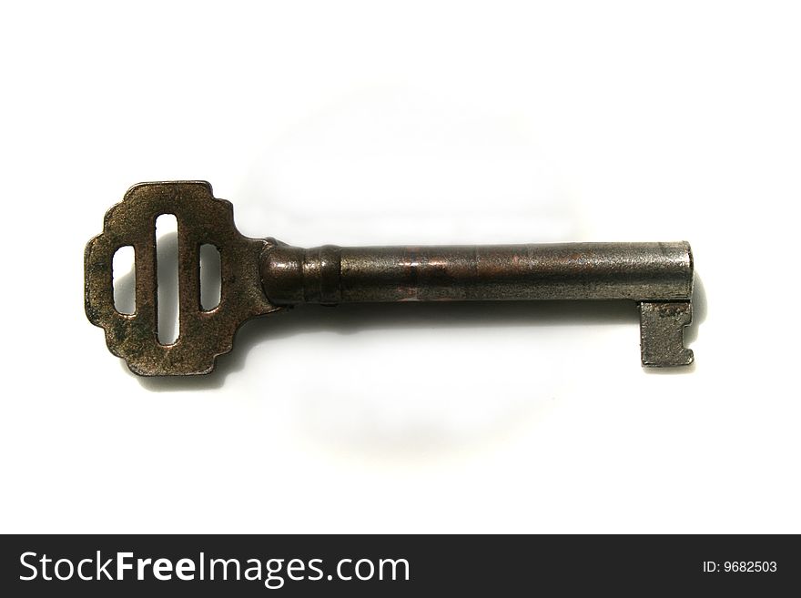 An ancient key on awhite background