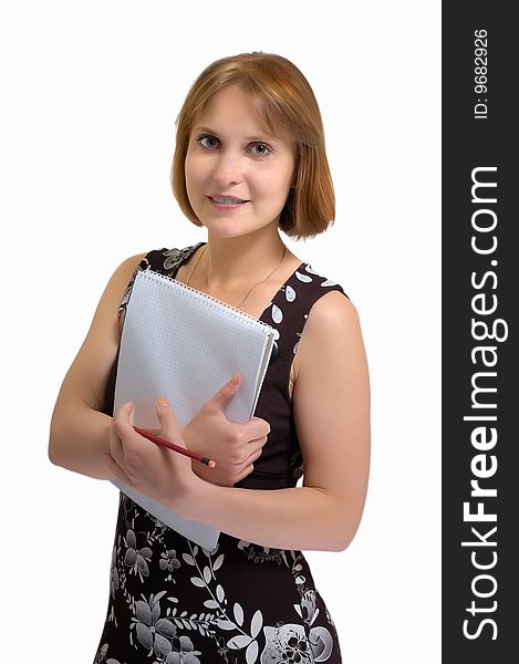 Attractive woman holding a notebook (on a light gray background)