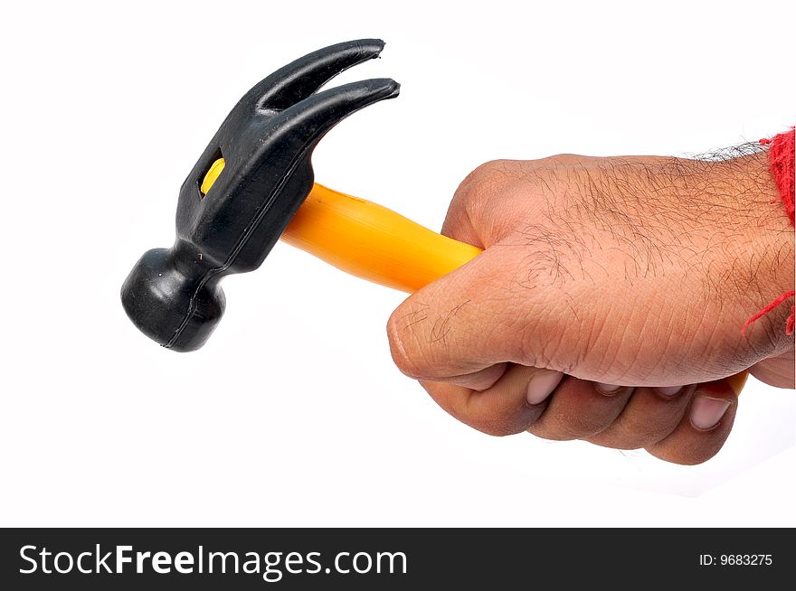 Hammer in hand isolated on white background.