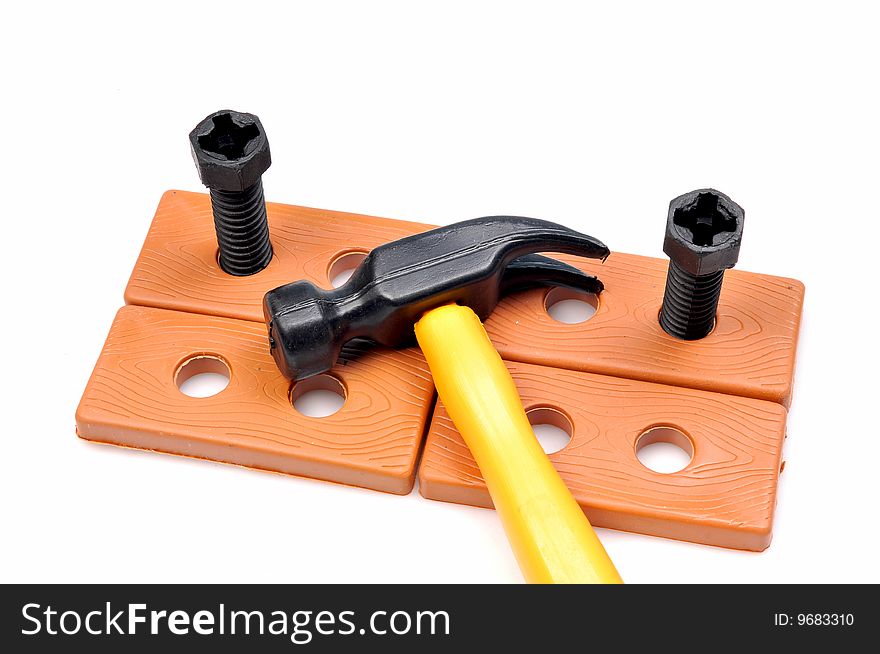 Bolts and hammer isolated on white background.