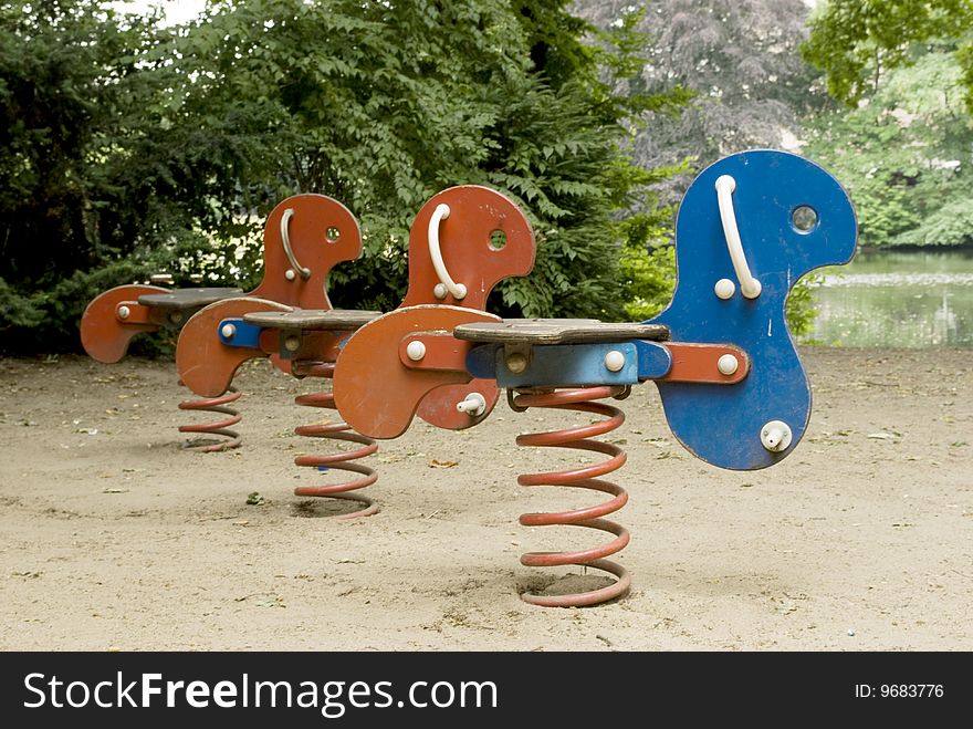 Spring Swings on children's playground in the park. Spring Swings on children's playground in the park