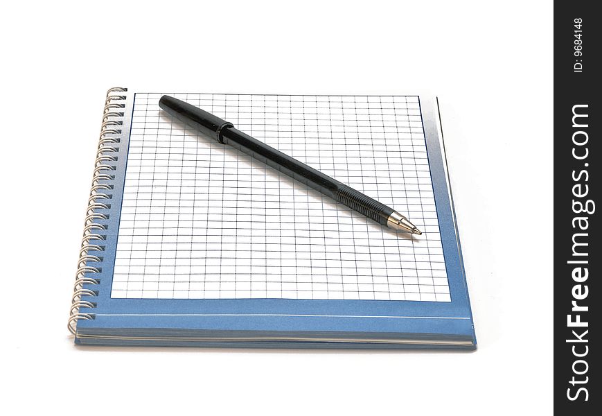 The pen and notebook on a white background