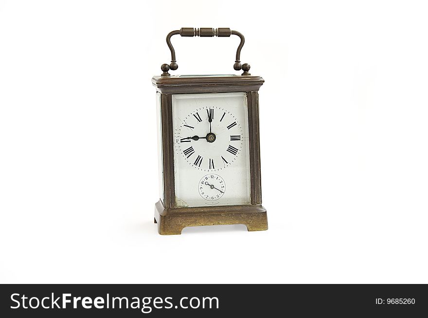 Ancient clock isolated over white.