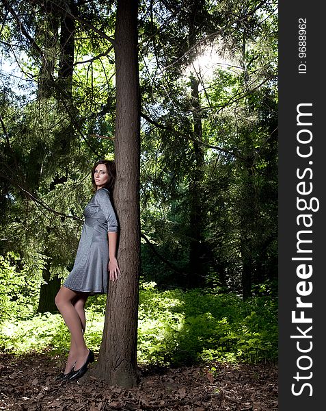 Beauty Woman In The Summer Forest