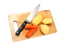 Knife Potato And Carrots Stock Photo