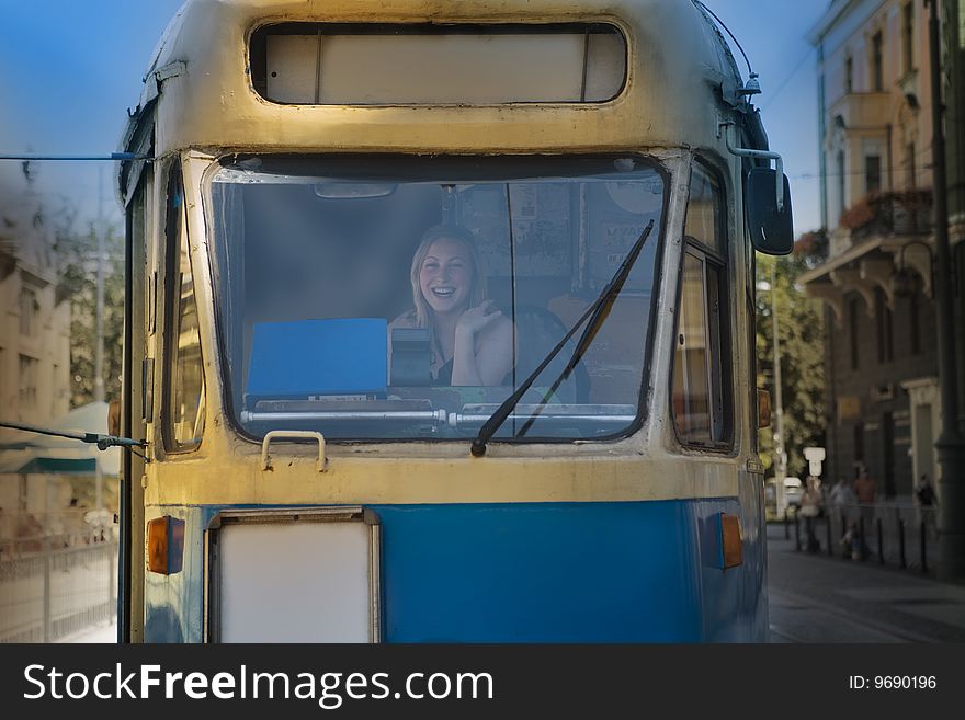 Woman in an old historical tram - city scene. Woman in an old historical tram - city scene