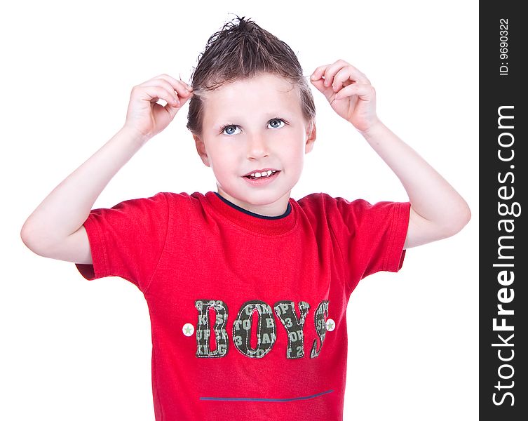 Cute blue-eyed boy posing in studio