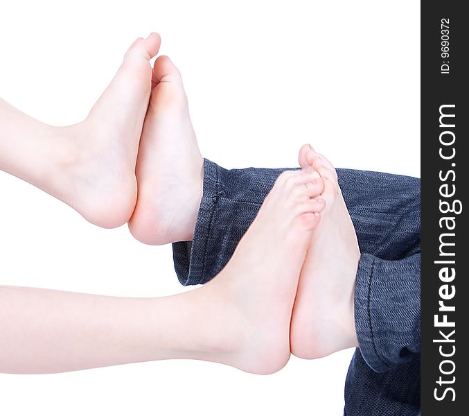 Boy and girl playing with yours legs, studio shot