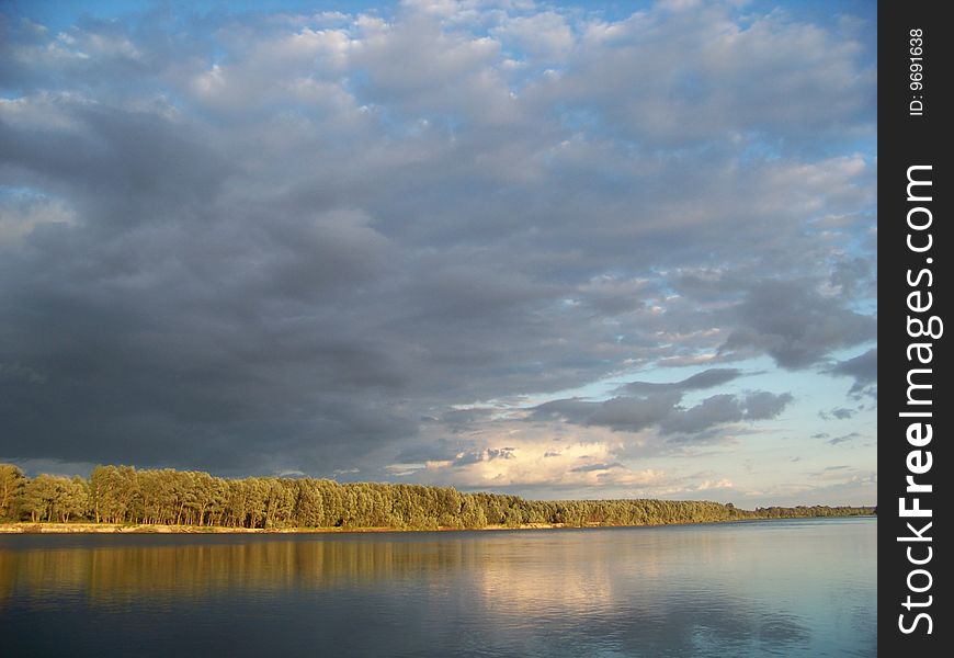 Big storm cloud on river