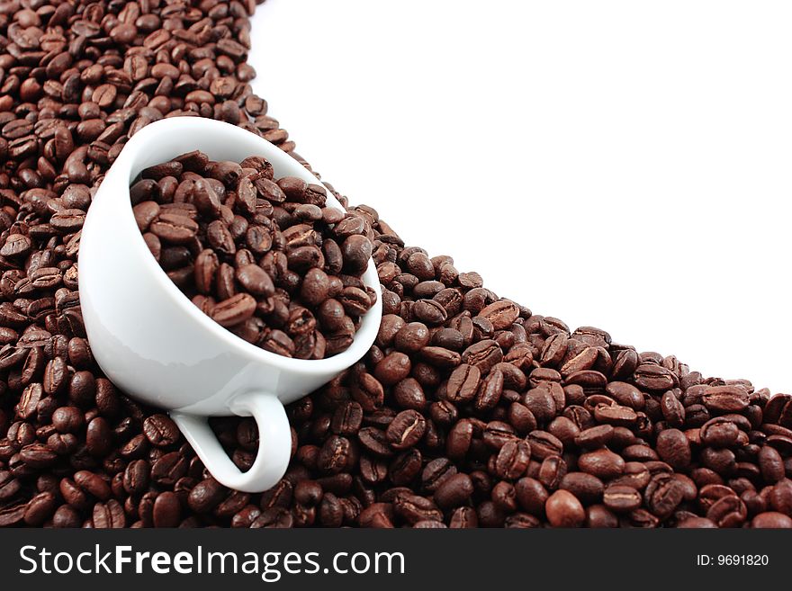 White Cup Filled With Coffee Beans