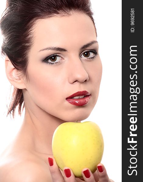 Close-up portrait of young beautiful healthy woman with yellow apple isolated on white. Close-up portrait of young beautiful healthy woman with yellow apple isolated on white