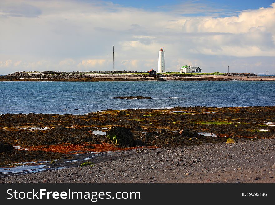 Beach And Lighthouse