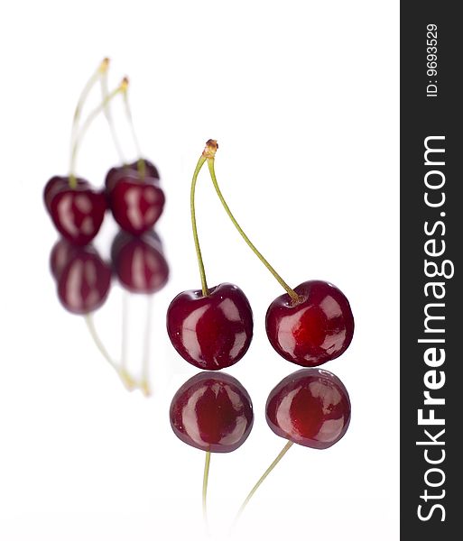 Pairs of fresh cherry with white background. Pairs of fresh cherry with white background