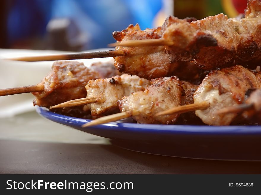 Pork kebab with onion on the BBQ