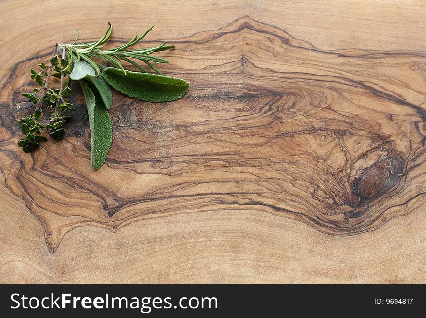 Herbs On A Wooden Board