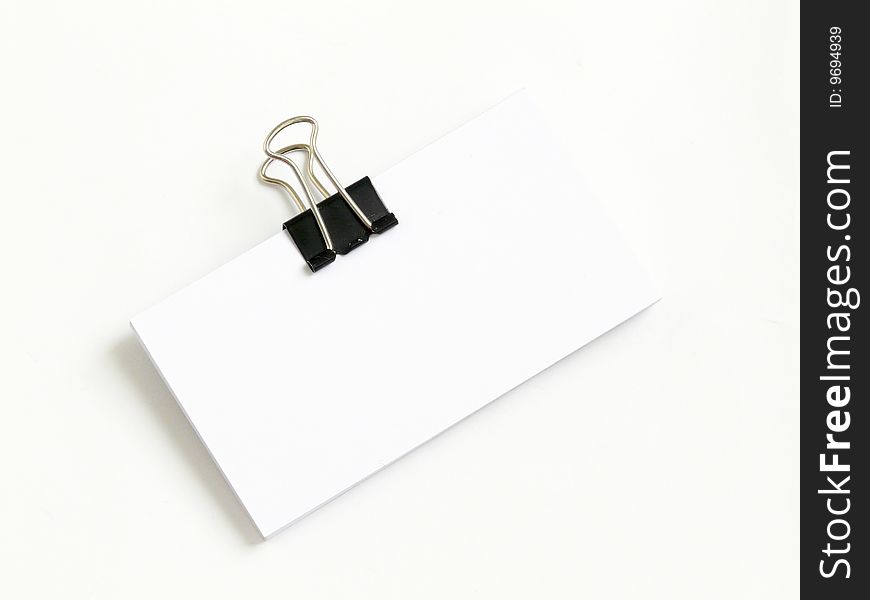 Block Of White Cards Attached With Paperclip