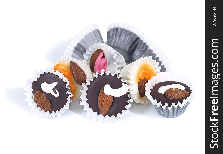 Chocolate Candies In White Paper Rosettes