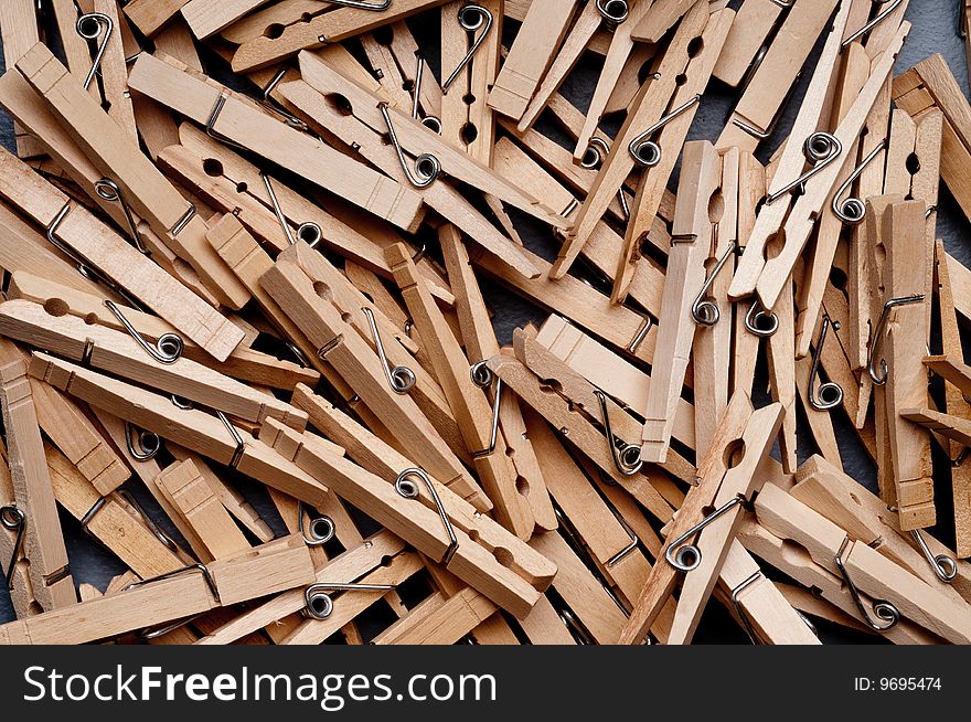 A closeup of a group of clothes pegs