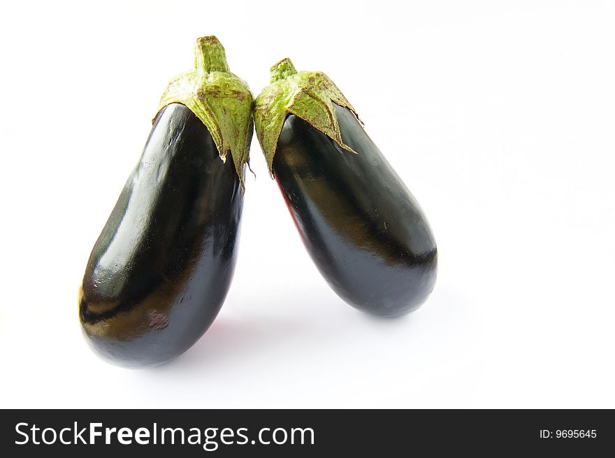 Two eggplants on a white background. Two eggplants on a white background
