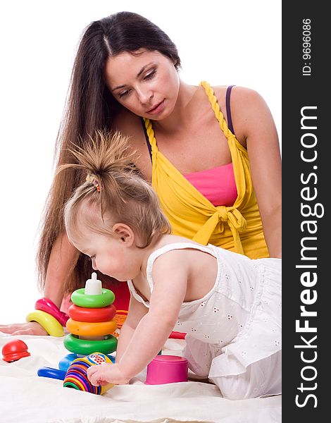 Little girl with beautiful mother isolated at white background