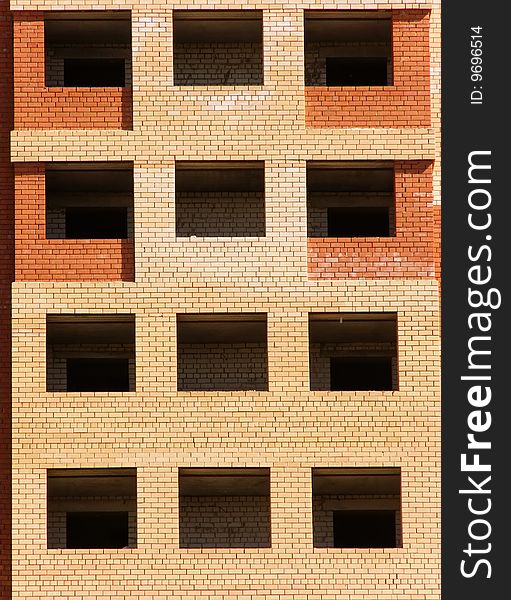 Windows of the house from a brick an abstract background
