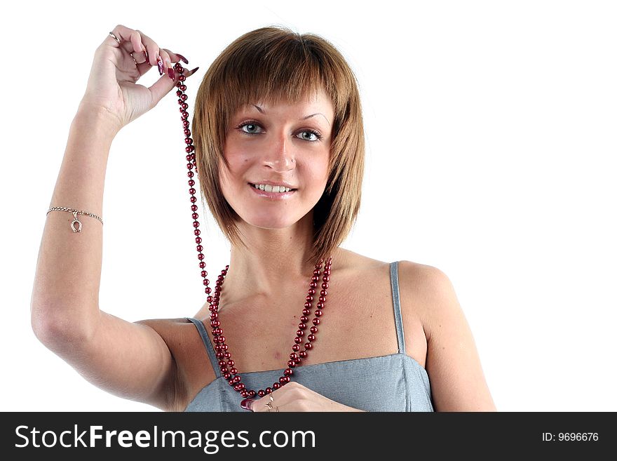 Portrait of sensual young woman with beads isolated on white background