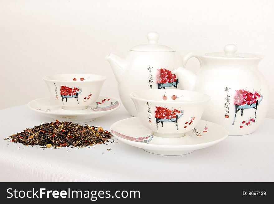 Green tea set on a white background