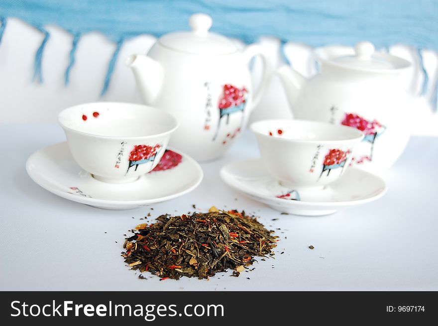 Green tea set on a white and blue background