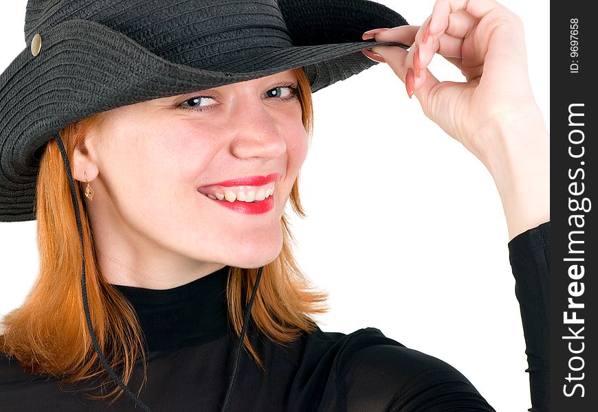 Sexy red young woman wearing a cowboy hat