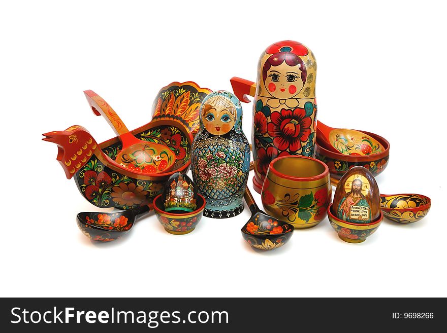 Assorted Russian folk wooden toys and utensils isolated. Assorted Russian folk wooden toys and utensils isolated