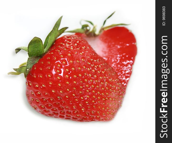 Close-up of strawberries on white background. Close-up of strawberries on white background.