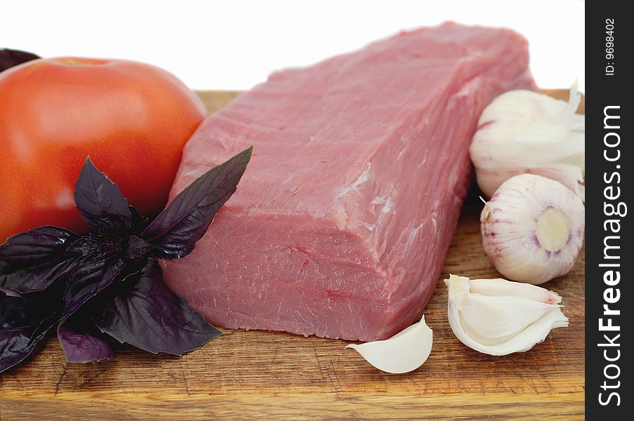Ribeye fresh Meat with garlic, basil and pepper
