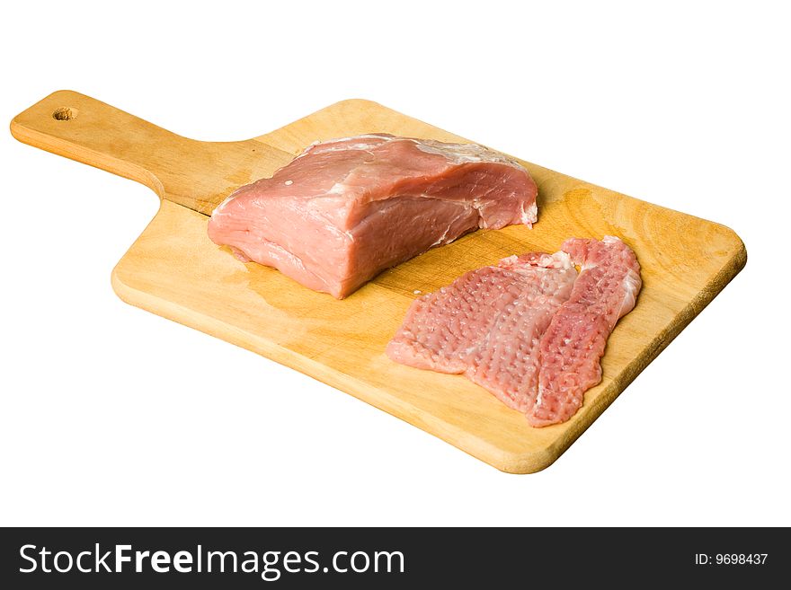 Raw pork meat on board isolated. Raw pork meat on board isolated