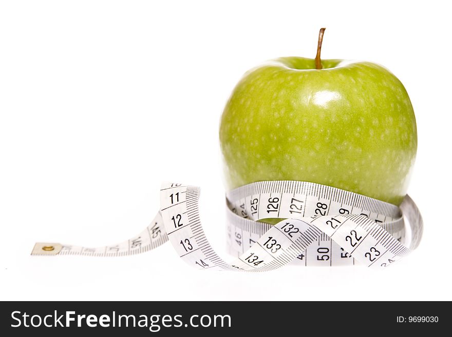 Apple with measuring tape