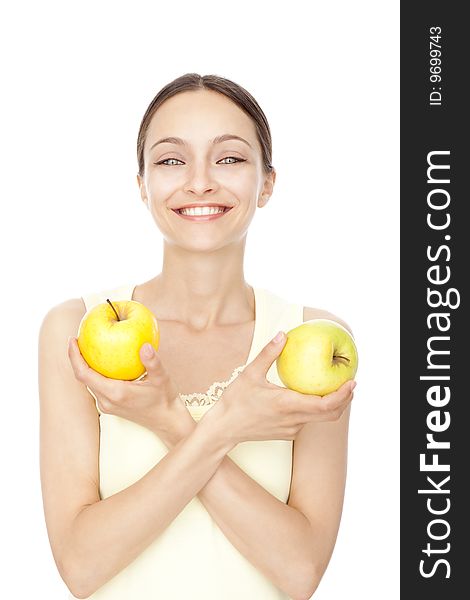 Young happy woman holding two apples isolated over white background