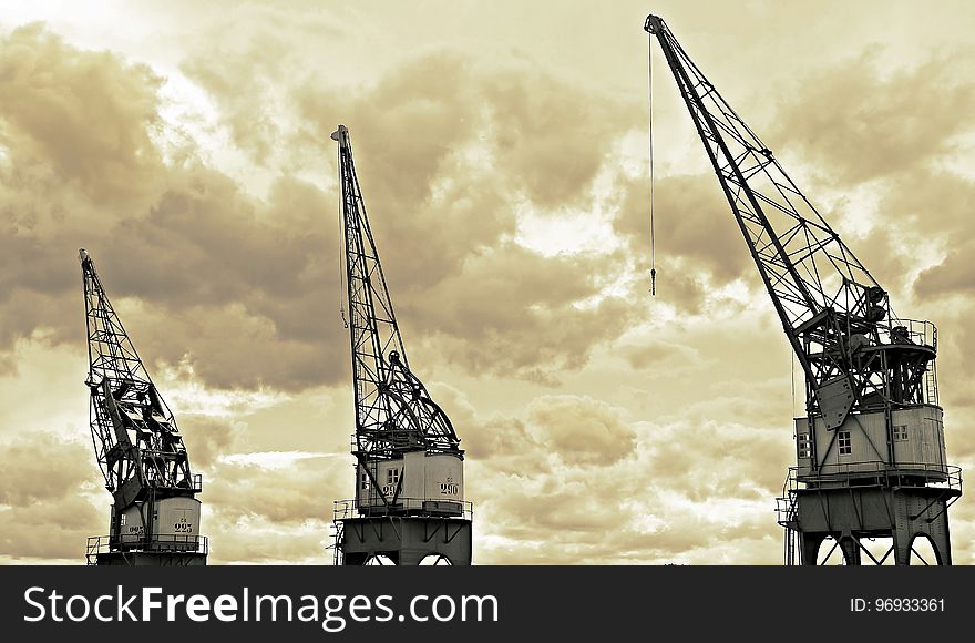 Architectural Photography of White and Black Metal Crane