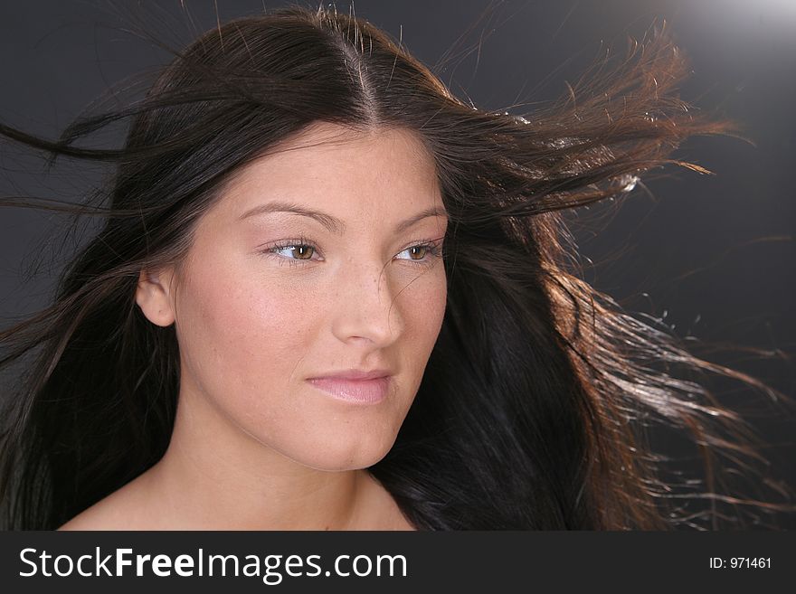 Young woman with long hair on the Wind. Young woman with long hair on the Wind