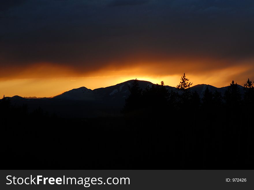 Sunset at Yellowstone Natl Park - mountains in the front