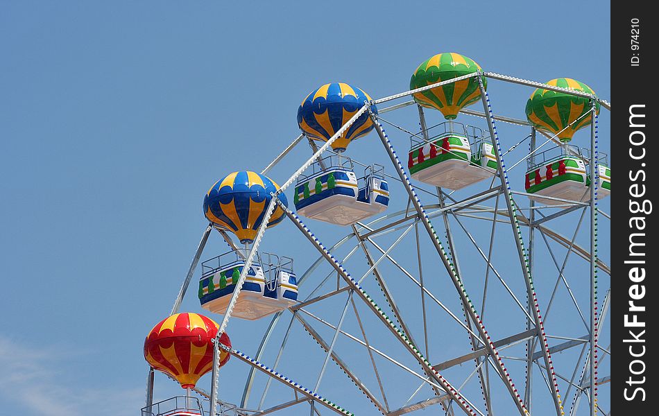 Shot of a ferris wheel, sunshine. Shot of a ferris wheel, sunshine